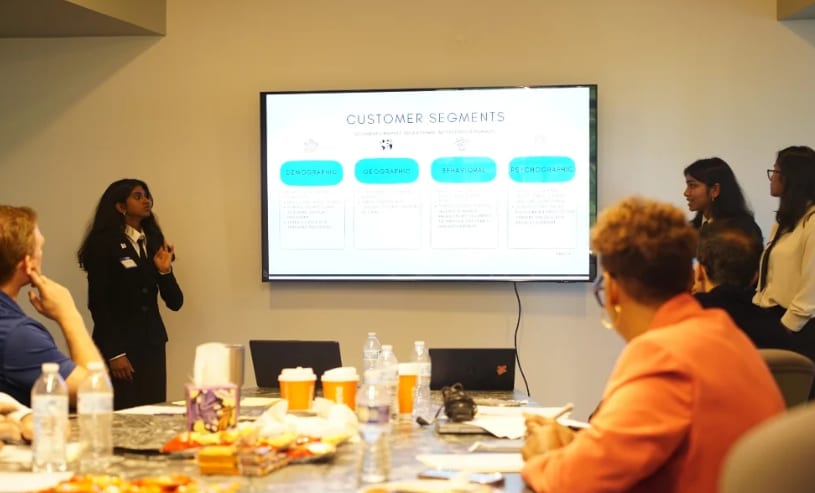 A finalist team presenting their customer segments